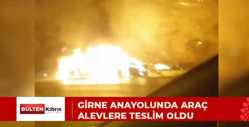 GİRNE ANAYOLUNDA ARAÇ ALEVLERE TESLİM OLDU, YANGIN KURU OTLARA SIÇRADI
